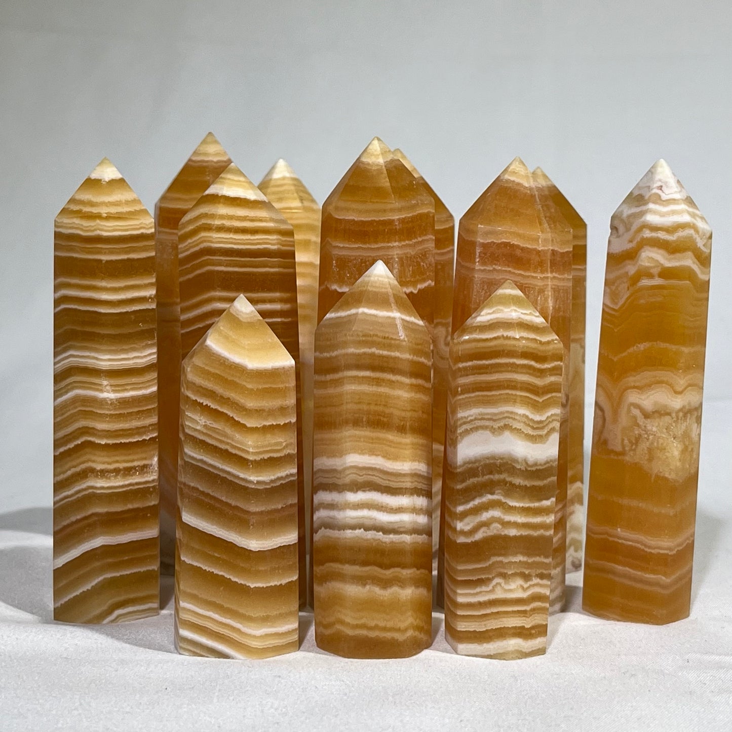 Orange Calcite Tower Wholesale Point