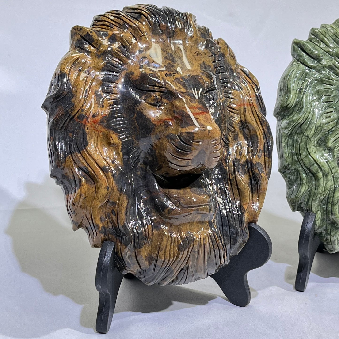 Lion Head Goldline and Jade Carving