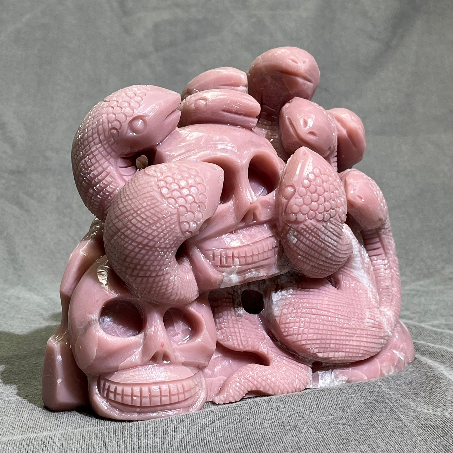 Pink Opal Skull with Snake Carving