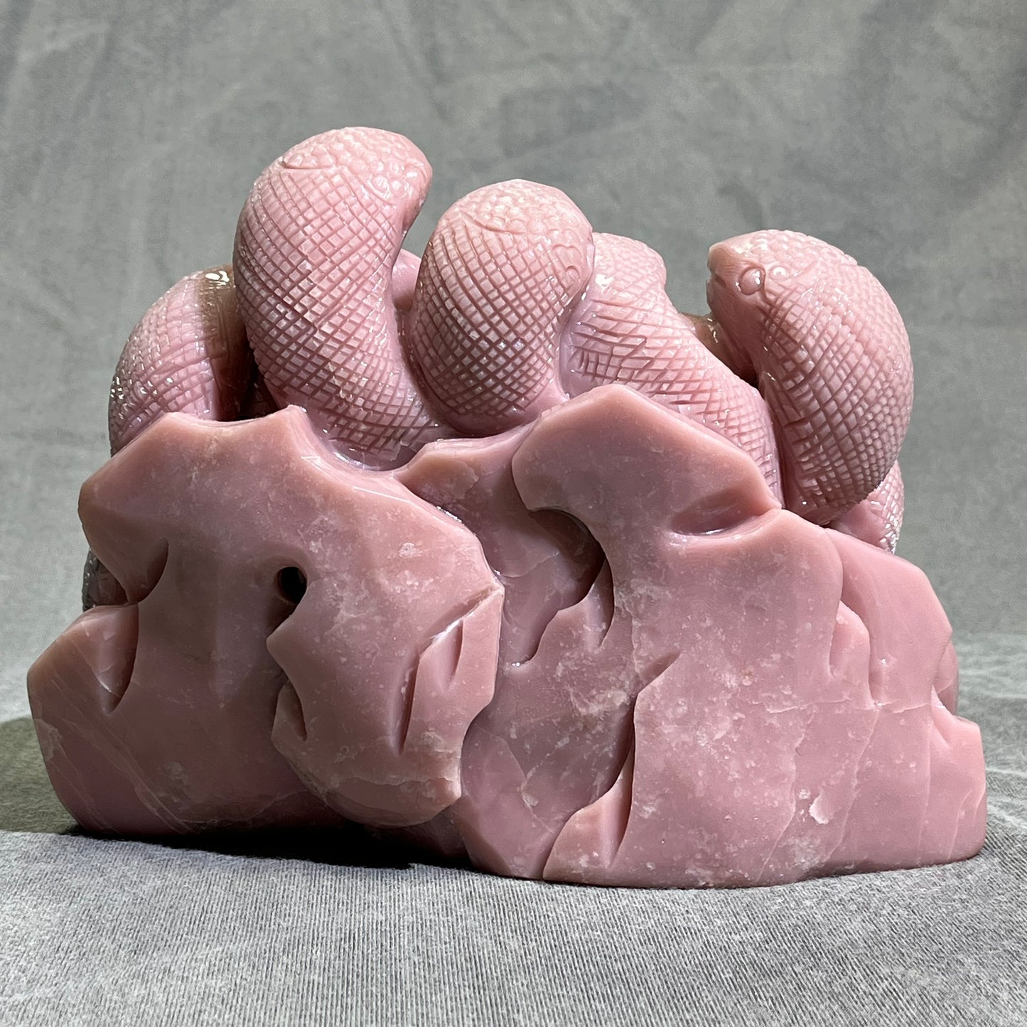 Pink Opal Skull with Snake Carving